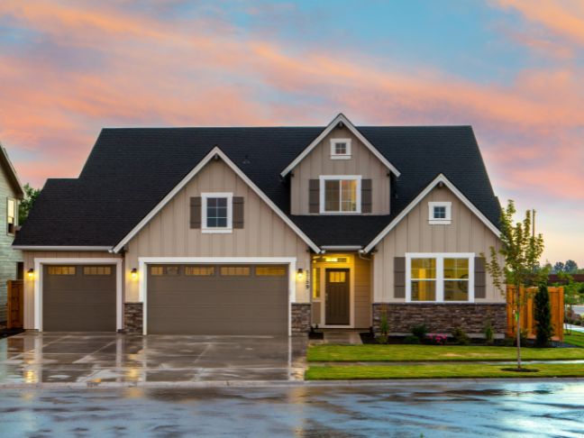 brown-and-gray-painted-house-in-front-of-road